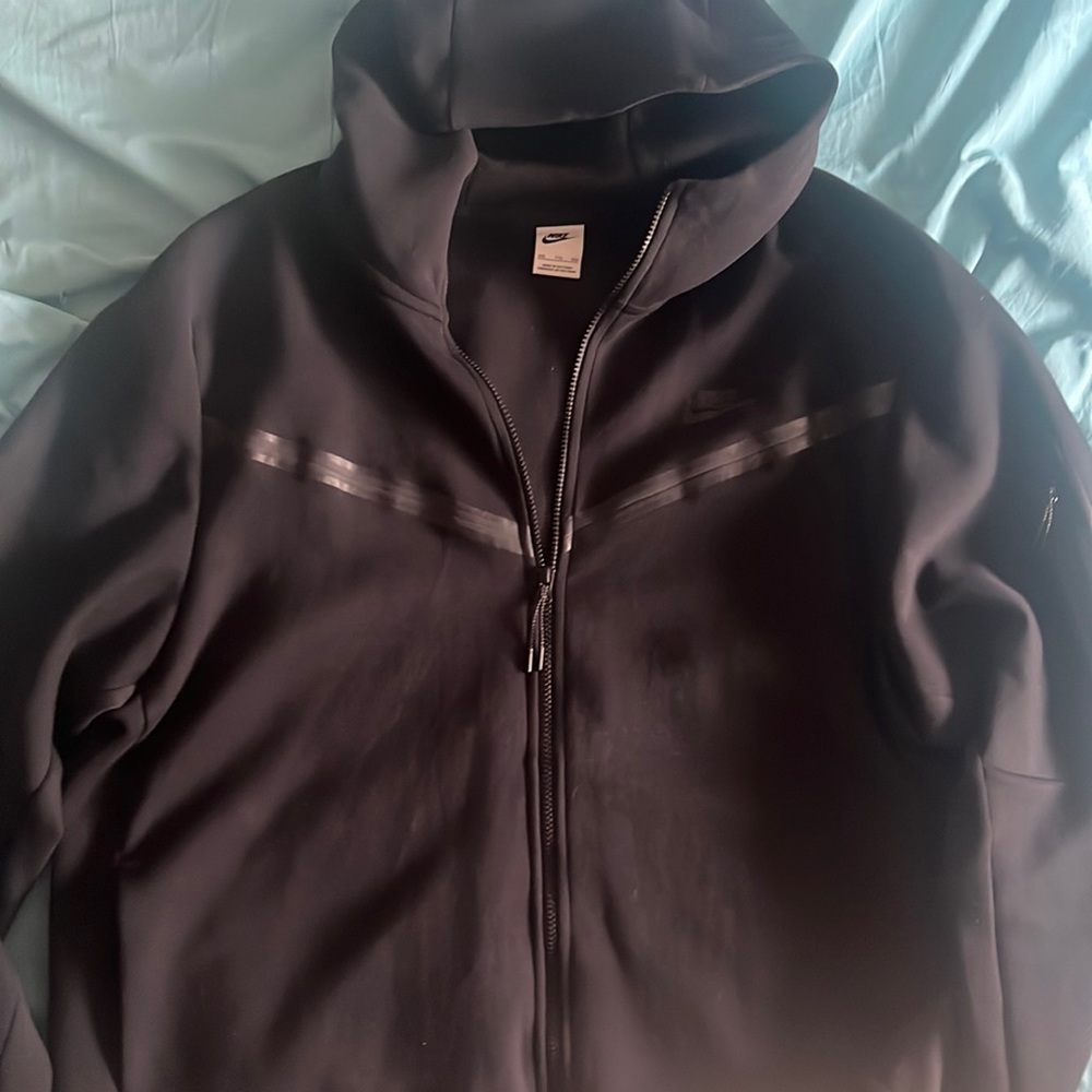 Black Nike tech jacket